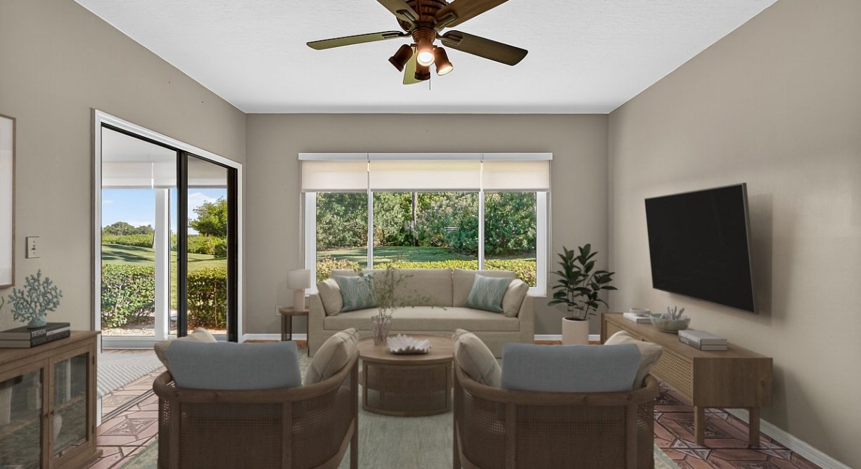 Virtually staged Livingroom photo for waterfront condo for sale at 6165 S Mirror Lake Drive #106 Sebastian, FL 32958