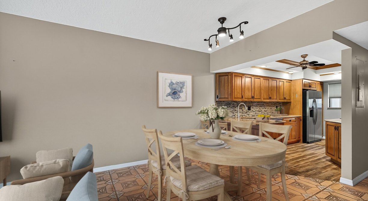 Staged photo of kitchen in condo for sale in Reflections on the River- Virtually staged Livingroom photo for waterfront condo for sale at 6165 S Mirror Lake Drive #106 Sebastian, FL 32958