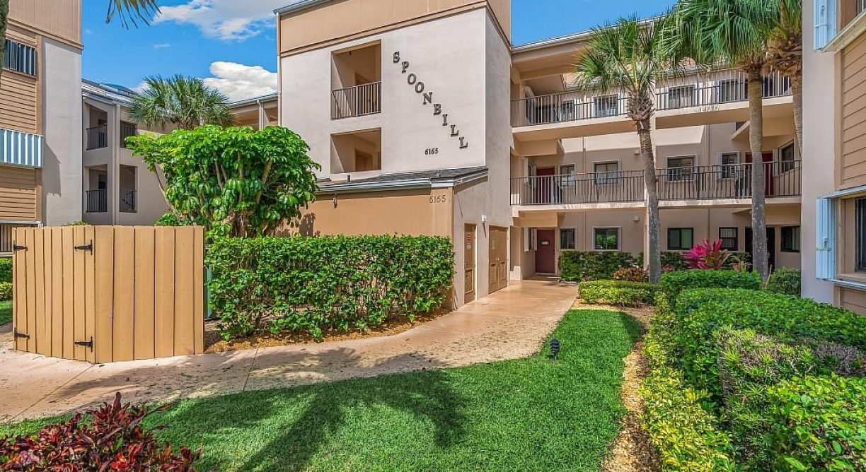 Spoonbill building exterior sign at 6165 S Mirror Lake Drive #106 Sebastian, FL 32958